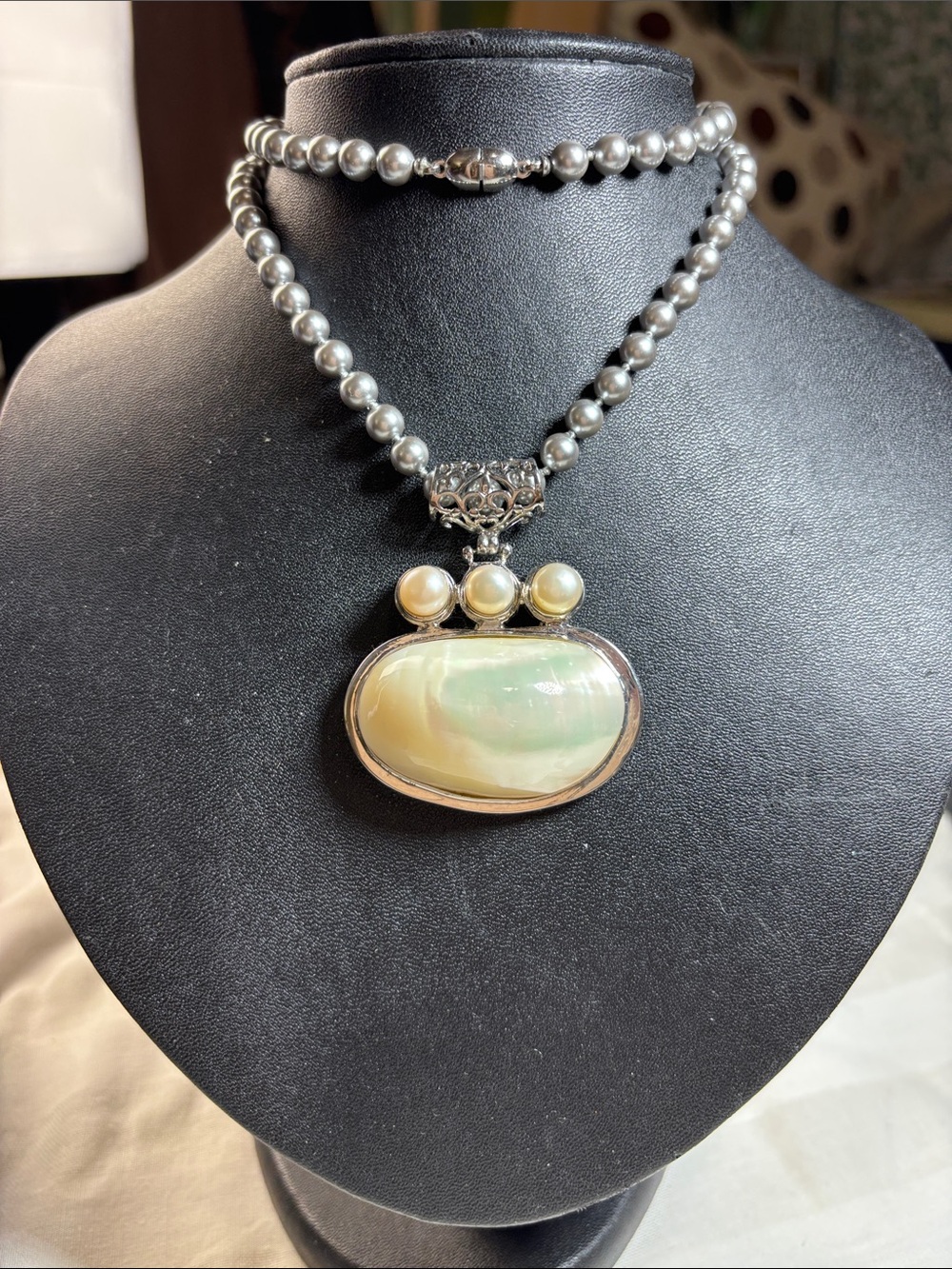 MOP - Mother of Pearl surrounded by 925 silver casing on a 925 chain.